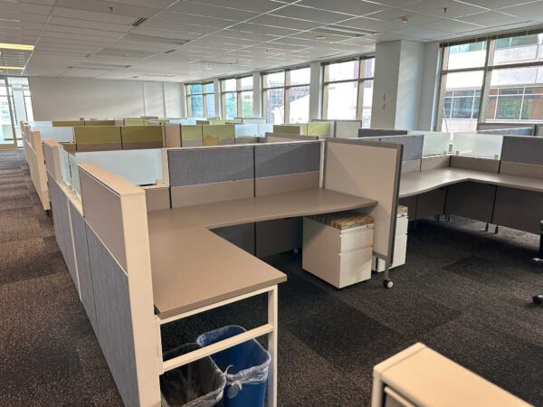 Herman Miller Canvas 5’x7’ and 6’x6’ Bullpen Configurations. Mobile whiteboards separate the workstations